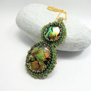 Hand embroidered pendant